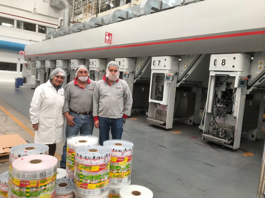 workers at flexible packaging plant